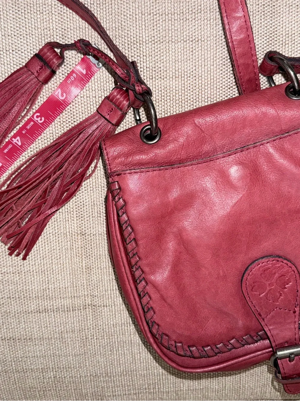 Patricia Nash Karis Leather Whipstitch Saddle Bag in a rich red/berry